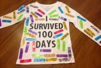 100 days of school tshirt with 100 colorful band aids. used vinyl