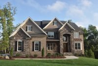 brick and stone exterior with a little siding | exterior of new home