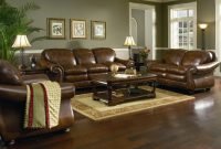 brown leather sofa set for living room with dark hardwood floors