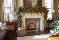 christmas mantel decorated with natural greenery in southern living