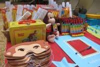 curious george decorations/party favors. and a frame for everyone to