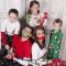 cute family christmas photo, kids take parents hostage | photo ideas