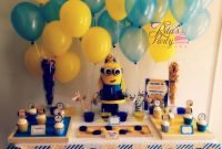 despicable me party table for a 6 year old boy. birthday cake in