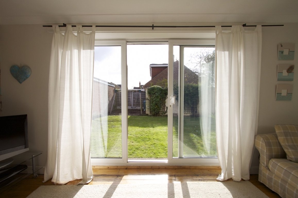 Should Living Room Sliding Doors Have Curtains