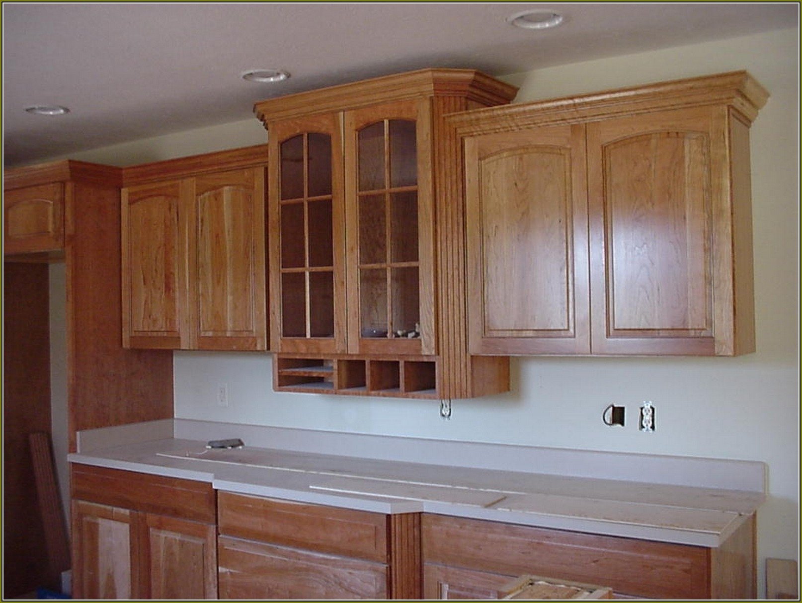 yellow wall olive cabinet burgundy trim kitchen