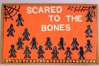 halloween bulletin board idea where students create skeletons