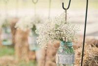 rustic outdoor wedding aisle decorations with mason jars and flowers