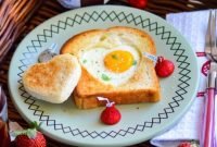 sunny side up egg-heart toasts for valentine's day breakfast recipe