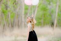 super cute outdoor graduating senior photo with balloons and chalk